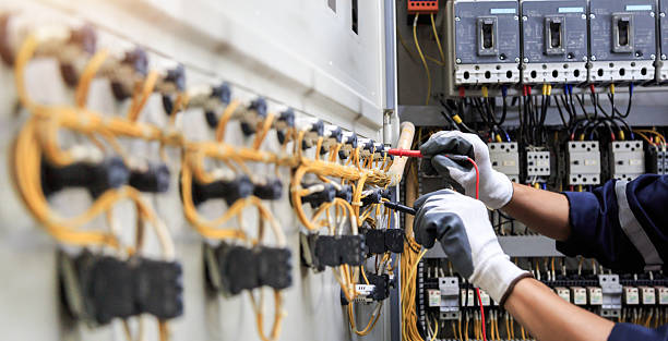 Professional Electrician technician working in Florida City, FL